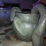 My slug mug in dark rich color of the clay before firing