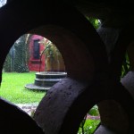 View of the courtyard through the tiles at the Instituto Cultural Oaxaca in the rain
