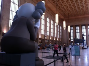 A view from the back of COMPANION art installation by KAWS at 30th Street Station