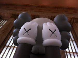 Closeup of COMPANION art installation by KAWS at 30th Street Station